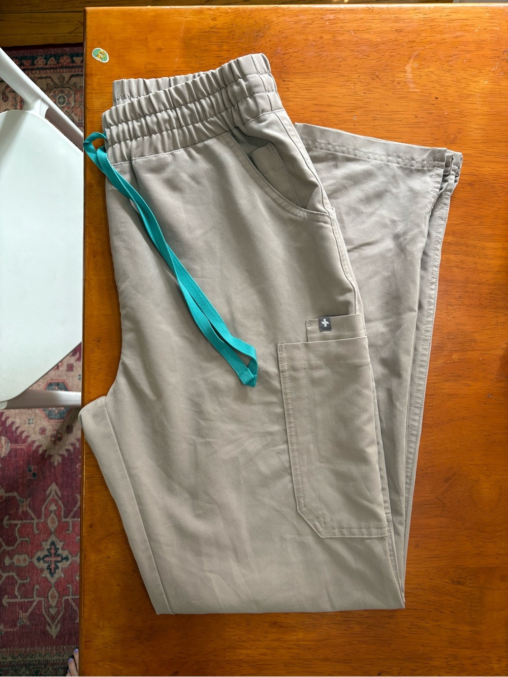 FIGS Yola High-Waisted Scrubs in Taupe with Teal Drawstring